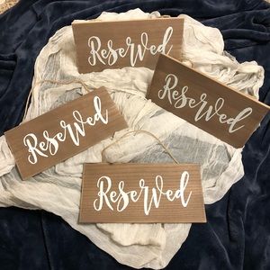 “Reserved” Signs